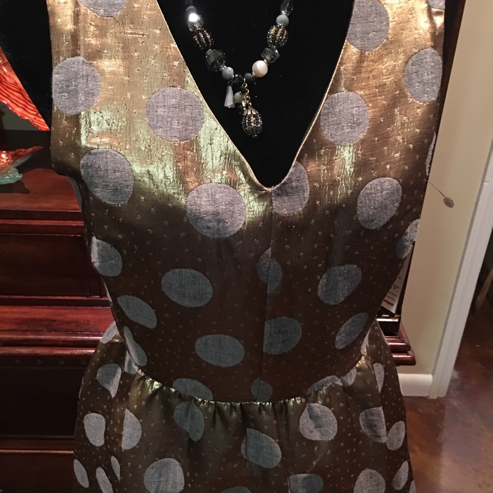 Dress gold/silver with pockets size Medium